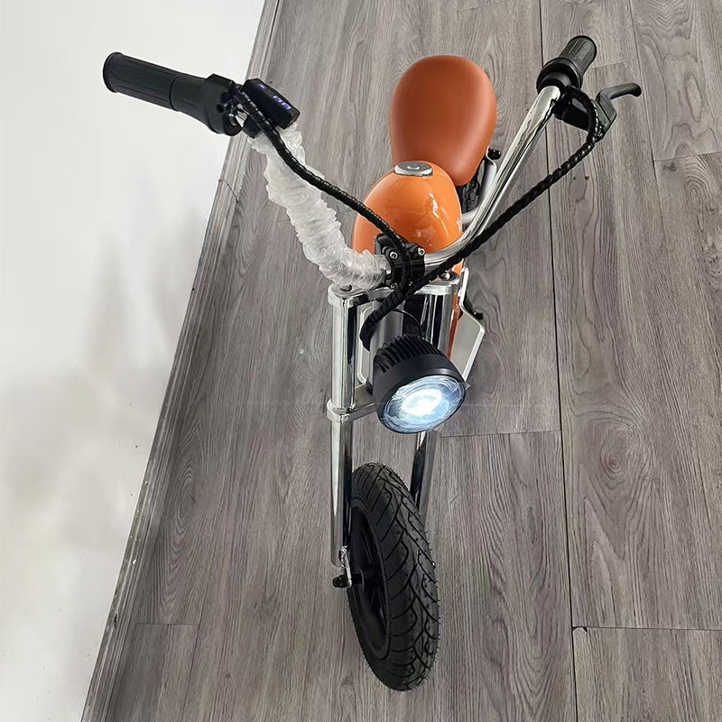 “Youmota Kids Electric Ride-On Motorcycle – 12” Air Tires, LED Lights, 10MPH, 150lb Max, Twist-Grip Throttle, Sound Effects - Orange