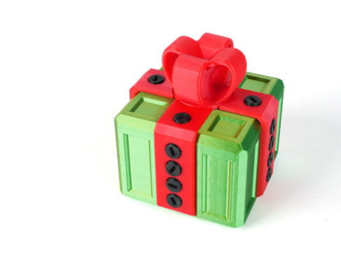 Annoying Screw Gift Box by I Got It First in green and red as an annoying gift box gag present