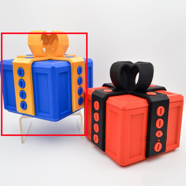 Blue annoying gift box gag present with orange screw details from I Got It First