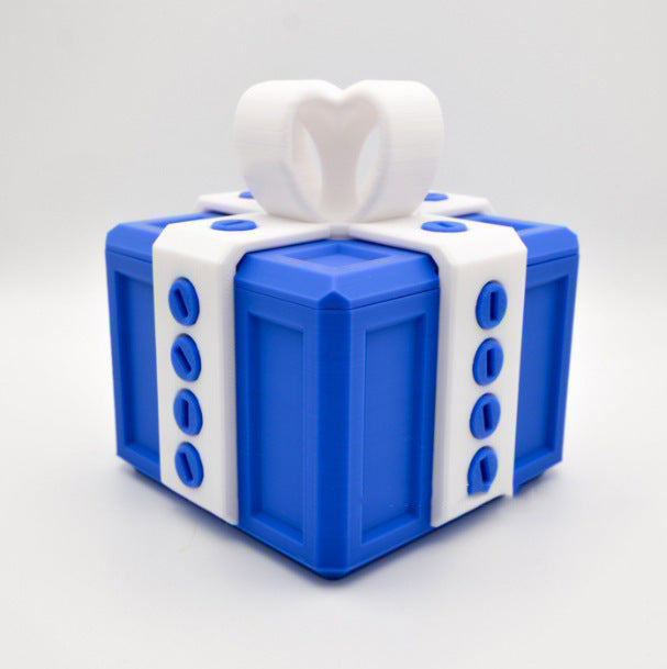 I Got It First annoying gift box gag present blue gift box with white screw details and heart-shaped bow
